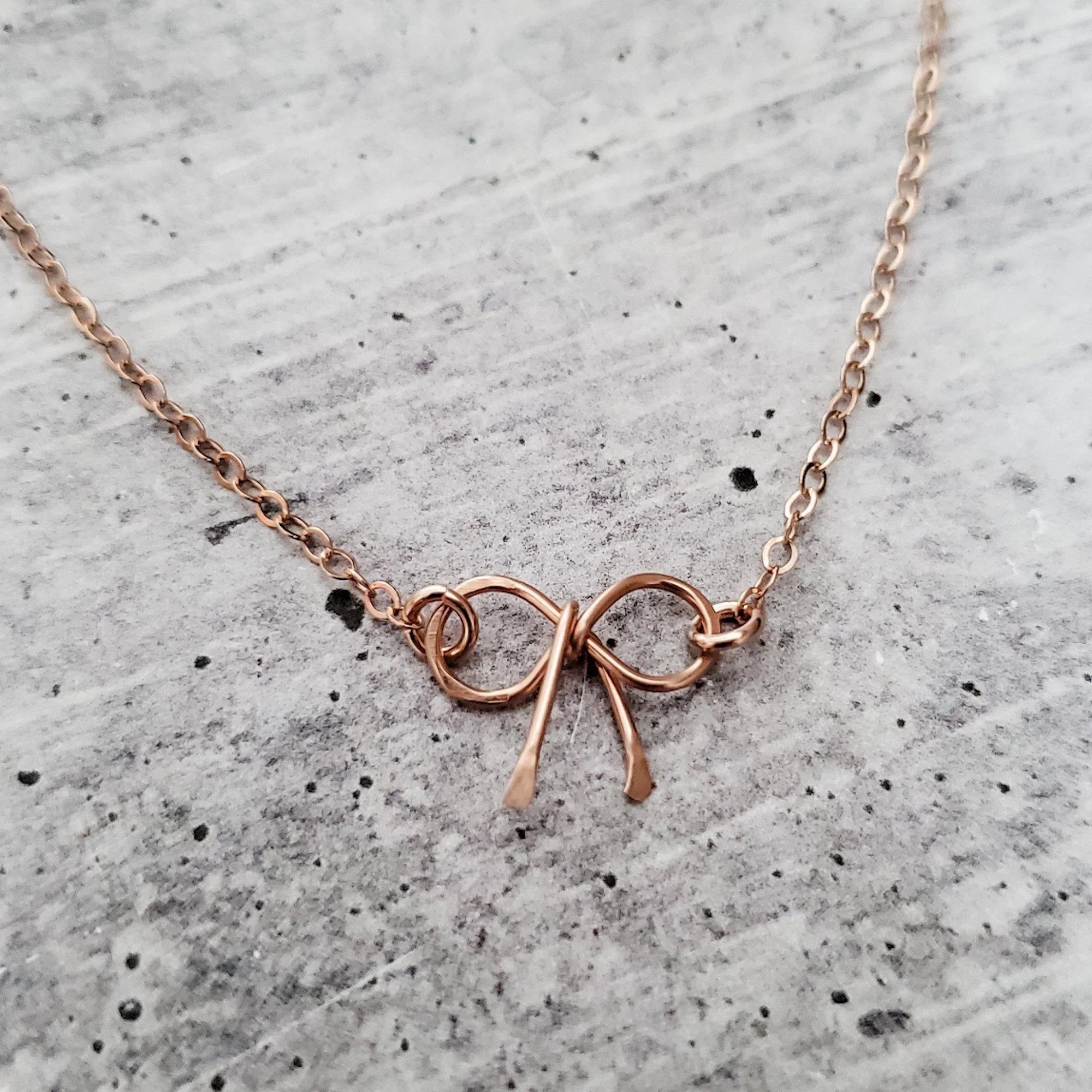 Dainty Bow Necklace by Salt and Sparkle - Image 2