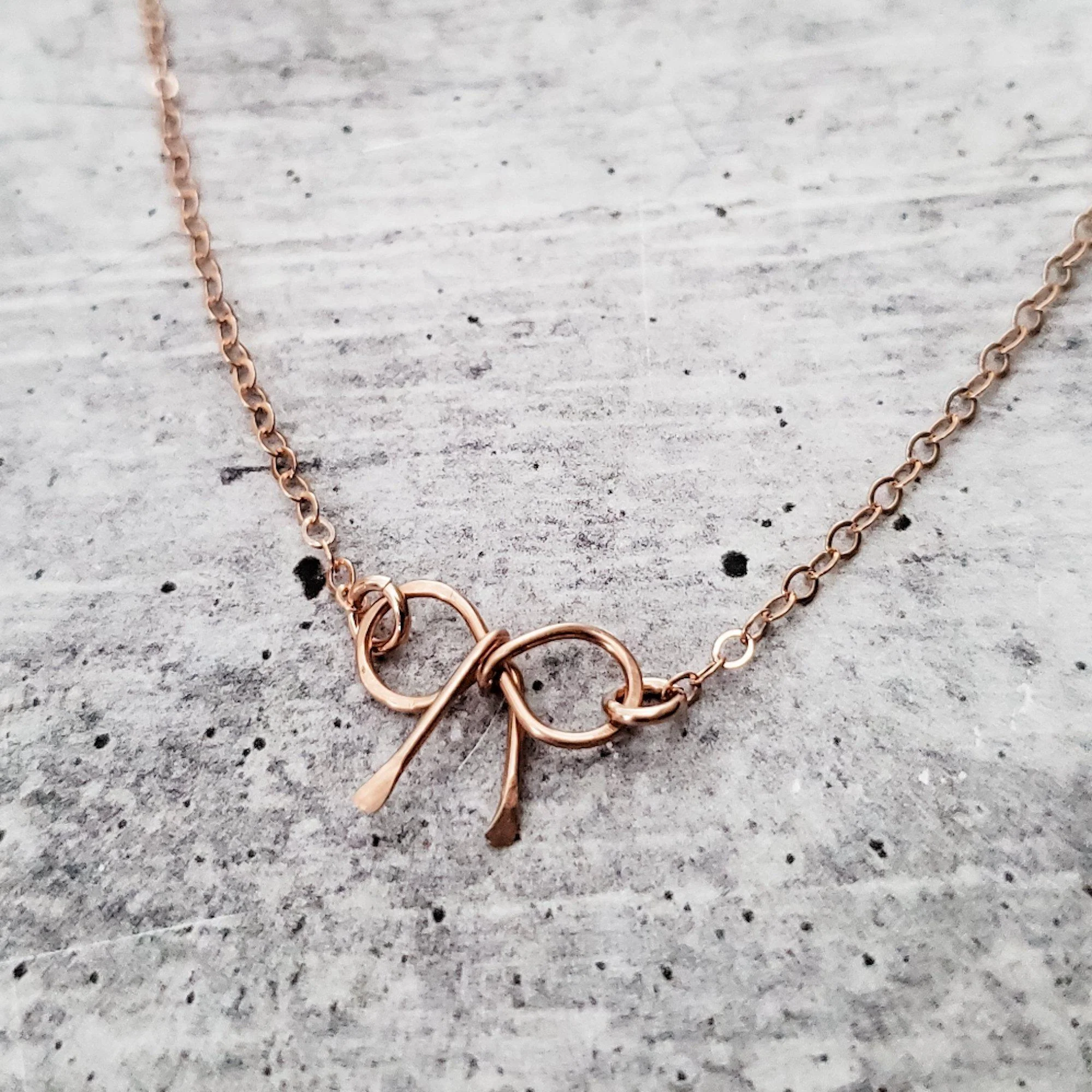 Dainty Bow Necklace by Salt and Sparkle - Image 4