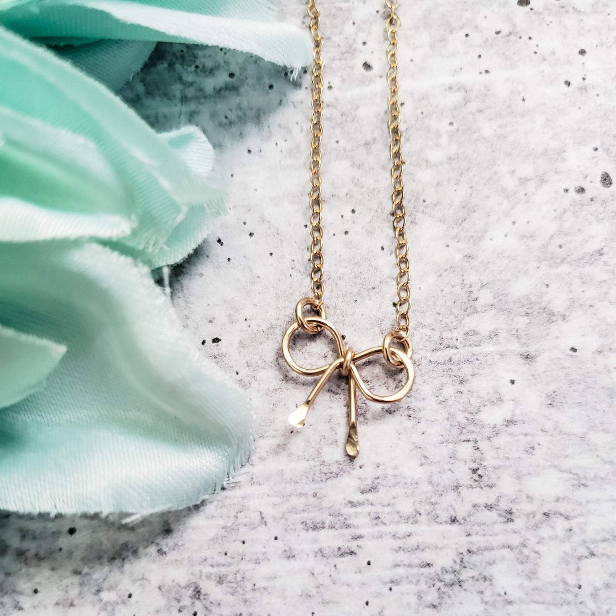 Dainty Bow Necklace by Salt and Sparkle - Image 5